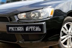 Накладка под номерной знак боковая Mitsubishi Lancer X 2007-2010 ШАГРЕНЬ