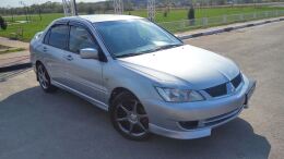 Накладки на внешние пороги Mitsubishi Lancer 9