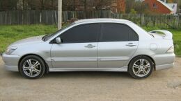 Накладки на внешние пороги Mitsubishi Lancer 9