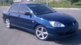 Накладки на внешние пороги Mitsubishi Lancer 9