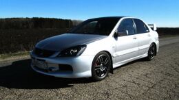 Накладки на внешние пороги Mitsubishi Lancer 9