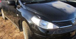 Накладки на передние фары (реснички) Nissan Tiida 2004-2013