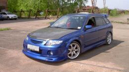 Реснички на фары для Mazda Familia BJ5W рестайлинг 2000-2003