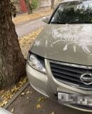 Накладки на передние фары (реснички) для Nissan Almera Classic 2007-2012