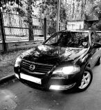 Накладки на передние фары (реснички) для Nissan Almera Classic 2007-2012