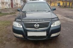 Накладки на передние фары (реснички) для Nissan Almera Classic 2007-2012