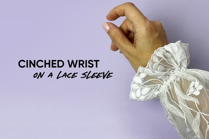 Cinched wrist on a lace sleeve