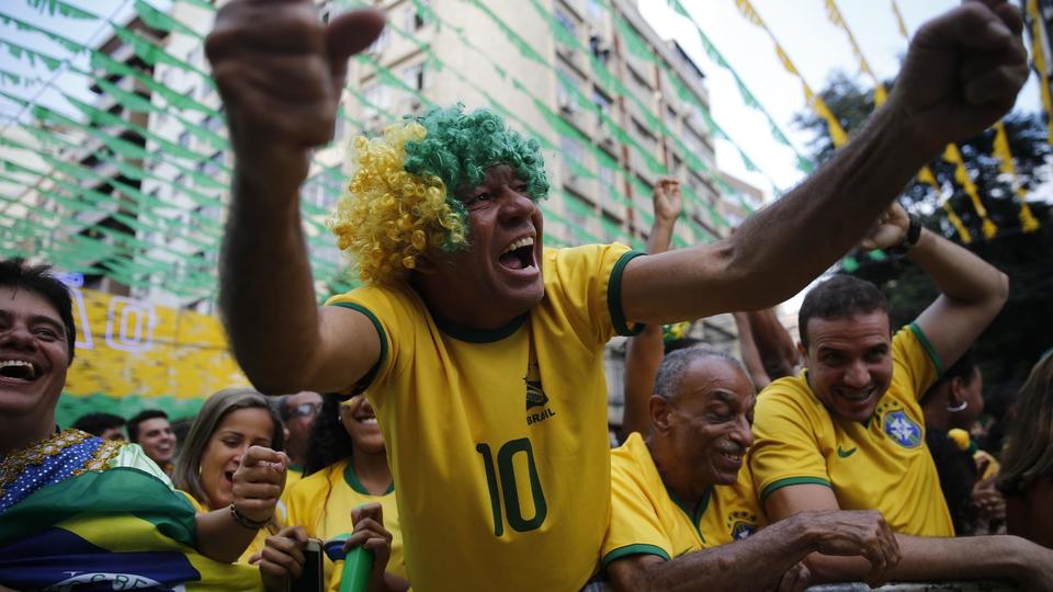 Fans gather in Rio fan zone to watch Brazil's World Cup opener against Serbia