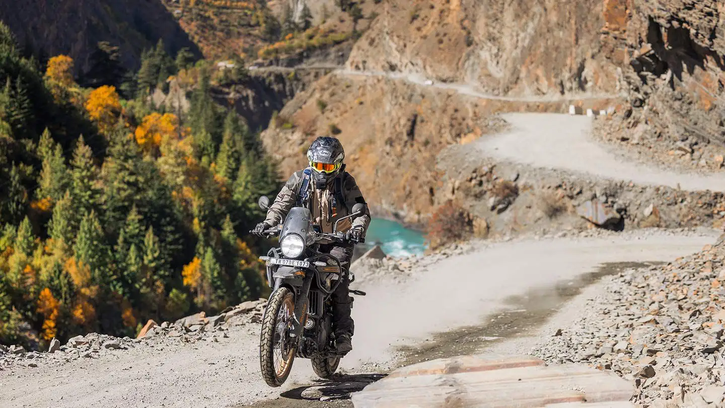 2024 Royal Enfield Himalayan riding on mountain dirt road