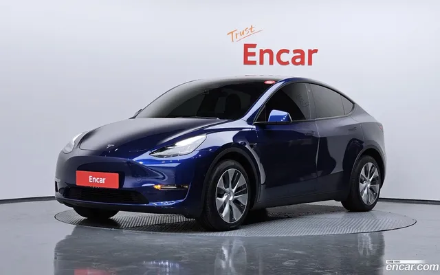 Tesla Model Y AWD — миниатюра 1