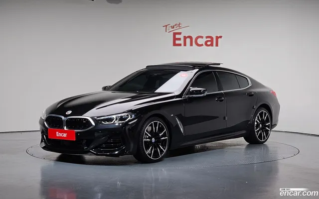 BMW 8 (G15) M850i xDrive — миниатюра 1