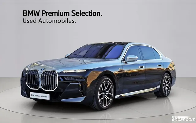 BMW 7 Series (G70) 740i xDrive M — миниатюра 1