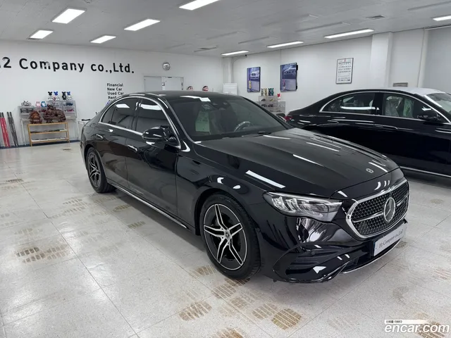 Mercedes-Benz E-Class (W214) E200 AMG Line — миниатюра 1