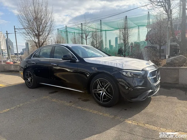 Mercedes-Benz E-Class (W214) E200 AMG Line — миниатюра 1
