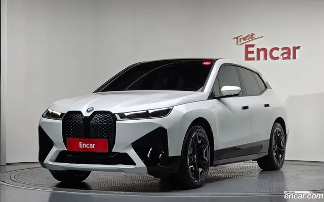 BMW iX xDrive50 — миниатюра 1